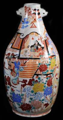 A Japanese Arita porcelain bulbous vase, decorated in orange and brightly coloured enamels with figures in a garden, shishi head handles, the base with six character mark, the top reduced, Meiji period, 54cm high. - 3