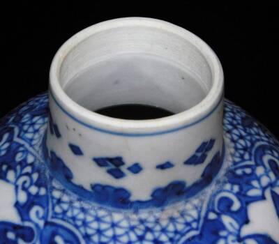 A Kangxi period blue and white baluster vase, with short neck from the Blue Chrysanthemum wreck, decorated with ribbons and bows beneath a shaped floral border, labelled beneath, 20cm high. - 4