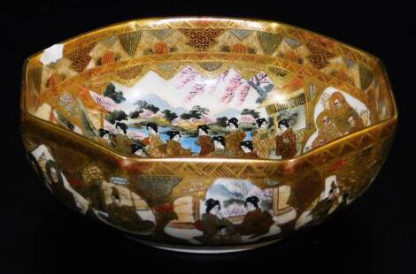 A Japanese Satsuma earthenware hexagonal bowl, decorated in colours and heavy gilt with shaped panels of sages, samurai, women and children within double diaper border, the exterior with similar panels, Meiji period, 18cm wide.