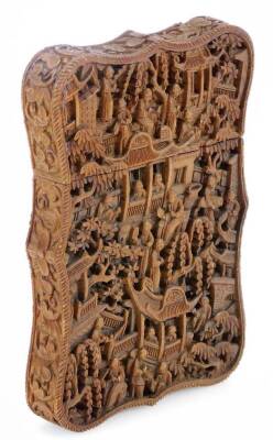 A 19thC Cantonese carved sandalwood card case, profusely decorated with many figures in an interior setting to both sides, 12cm high.