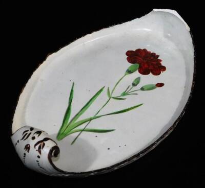 A 19thC Davenport pottery dish, of oval outline with scroll handles, naively hand painted with a flower in green and red with brown highlights, 27cm wide, a 19thC copper lustre jug and a saucer. (a quantity) - 9