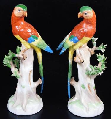 A pair of 20thC Dresden porcelain parrot figures, each polychrome decorated on tree bow bases, marked beneath, 33cm high, an early 19thC hand painted dish decorated with summer flowers, Continental porcelain bird figure group, a 19thC French porcelain jar - 6