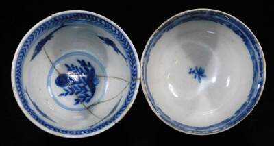 A Chinese porcelain Kangxi tea bowl, of circular form, with an upper floral border, the main body decorated with further trees, bird and buildings, on a circular foot, double line leaf mark beneath, 8cm diameter and a further 18thC Chinese porcelain tea b - 4