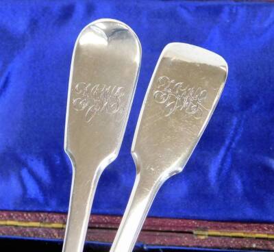 A Victorian silver christening set, comprising fork and spoon, fiddle pattern, initialled London 1860, 2.8oz. (cased) - 2