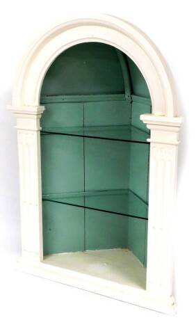 A Georgian and later corner cupboard, with arched top and reeded and fluted supports, 100cm high.