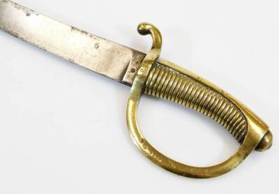 A sword, with curved plain blade, leather scabbard with brass mounts and shaped handle marked 1804 the scabbard marked 27, 73cm long. - 2