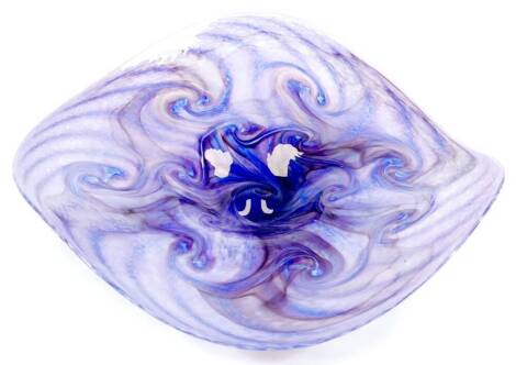 A 20thC studio Our Glass dish, of shaped form, with a swirl pattern predominately in purple, possibly Swedish, signed, 40cm wide.