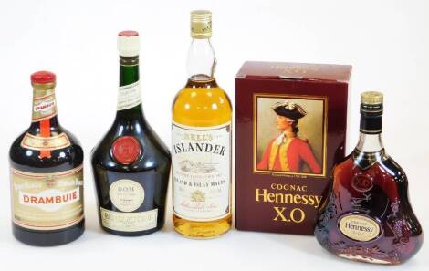 A bottle of Bell's Islander Island & Lay Malts, litre bottle, 33cm high, various other alcohol, Benedictine, box of Hennessy Cognac XO. (3)