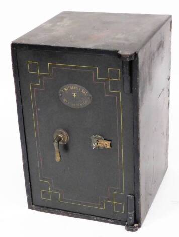 An early 20thC T Withers and Son cast iron floor safe, of rectangular form with shaped handle and key, 62cm high, 41cm wide, 42cm deep.