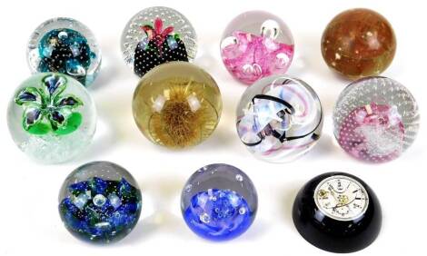 Various paperweights, to include Caithness, Pink Champagne 9cm high, various others, etc. (a quantity)