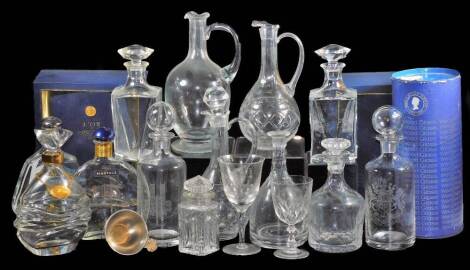 Various advertising decanters, etc., to include a Westminster Abbey example, of shouldered circular form with orb stopper, two vacant cognac L'or Martell presentation cases with vacant decanters, collection of other decanters, boxed wine funnel, commemora