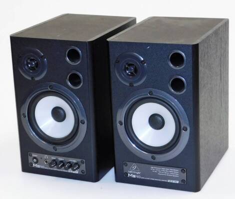 A pair of Behringer MS40 40 watt stereo speakers 24192, in black, with front tuning knops to one, 28cm high.