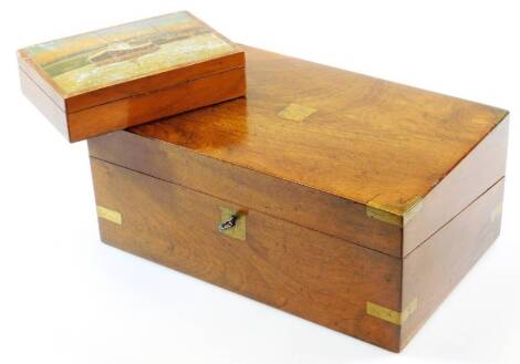 A mid 19thC mahogany campaign writing box, with brass mounts and a vacant shield shaped cartouche to the lock and top, with a fitted interior, 34cm wide and a further painted mahogany box set with ships on a twilight evening. (2)