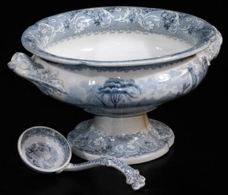 A late 19thC Rhine transfer printed soup tureen, with moulded handles on a shaped foot, 30cm wide, with ladle. (2)