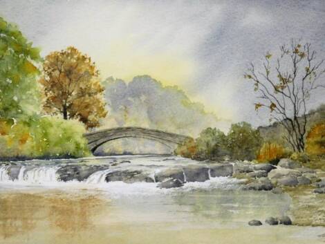 Barbara Fraser (20thC). Stream and bridge before trees with clouds gathering, watercolour, signed, 22cm x 31cm.