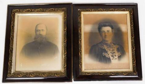 Victorian School. Lady and gentleman portraits, in elaborate frames, albumen type prints, 51cm x 41cm. (2)