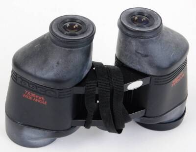 A pair of Tasco Japanese in focus binoculars, 13cm high, in fitted case. - 2