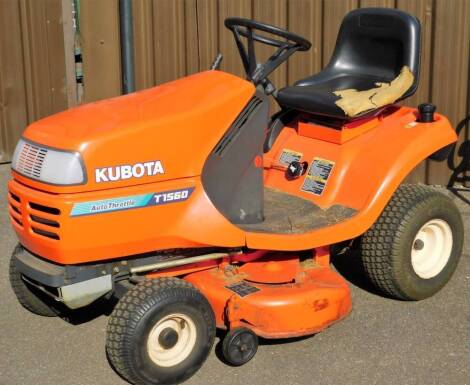 A Kubota Anti Scalp T1560 auto throttle ride-on lawn mower, in orange, with manual, 115cm high.