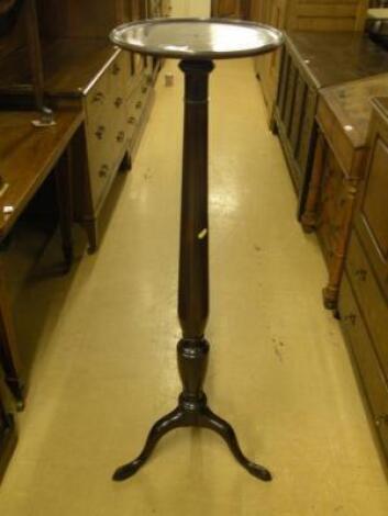 A mahogany torchere