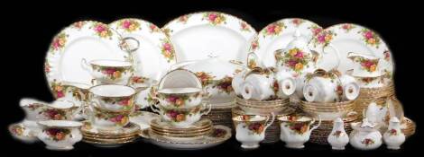 A comprehensive Royal Albert Old Country Roses part dinner service, to include twelve dinner plates, 26cm diameter, lidded tureen, teapot, dessert bowls, gravy boat on stand, serving dish, oval meat plate, two tier cake stand, soup bowls, milk jug, sugar 