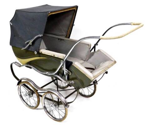 A vintage Montford pram, with adjustable canopy in light blue and a green and cream metal base with four two sized wheels, with chrome handle, 96cm high.