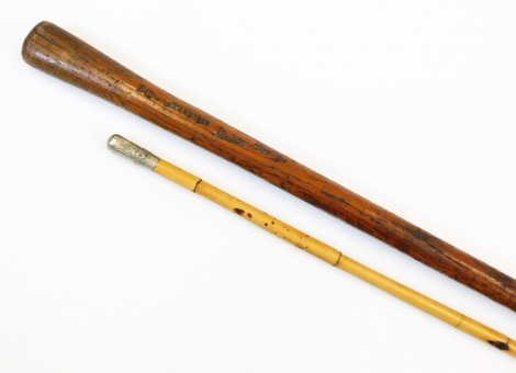 An early 20thC cane swagger stick, with plated ubique crested tip, 69cm long and a 19thC walking stick marked Earl Cowpr September 10 1877. (2)