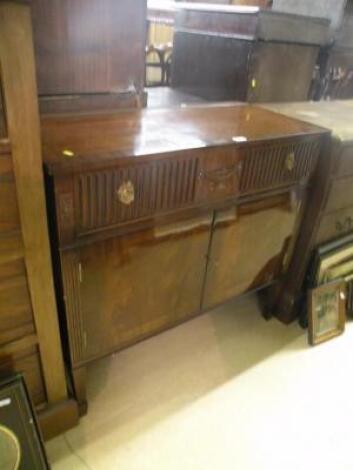 H Epstein of London. A mahogany gramophone cabinet and a keyboard<br