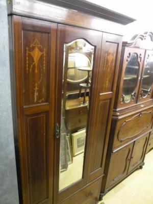 An Edwardian mahogany marquetry and chequer banded wardrobe with