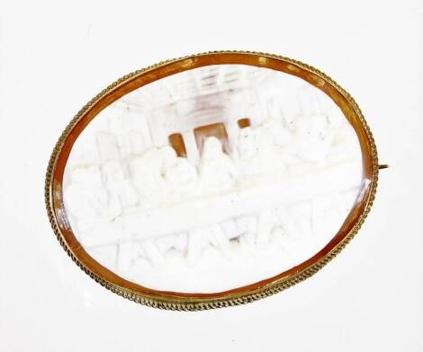 A 9ct gold mounted oval cameo brooch The Last Supper, plain pin back, 5cm wide.