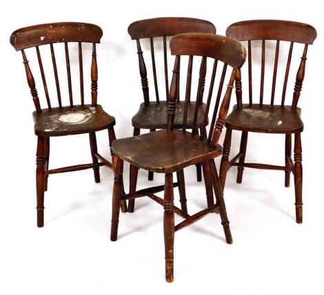 A set of four Victorian spindleback kitchen chairs, each with spindle backs, turned front legs and H stretchers, 83cm high. (4)