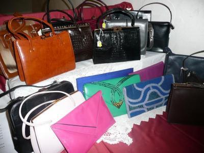 A group of ladies handbags in various styles and finishes - skin