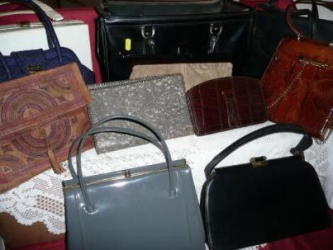 A collection of ladies handbags in leather