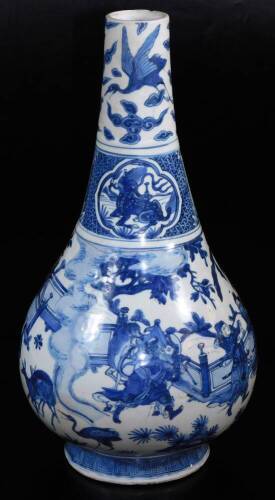 A Chinese Kraak blue and white bottle vase, of globular form with cylindrical stem, decorated with panels and figures before fence, trees and clouds, on a circular foot with a lower Greek key design border, raised on a deep foot, unmarked, 43cm high. (AF)