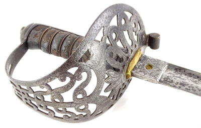 A British 1887 pattern heavy cavalry officers sword, a stamped for Wilkinson, the blade engraved with a cipher of George V, Shagreen handle and pierced steel guard, lacking scabbard, 102cm long.