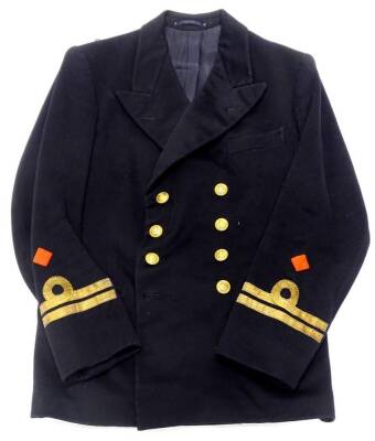 A World War Two named naval jacket, with gold piping, etc.