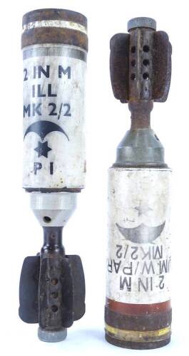 A pair of 20thC mortar shells, with fins to one end, various markings, to include HMW 4/68, 2INMILLMK2/2, PI, 24cm long.