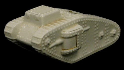 An Arcadian China crested model of a First World War tank, bearing crest for Wimbledon, printed mark in black to underside, indistinct registration number, 17cm long.