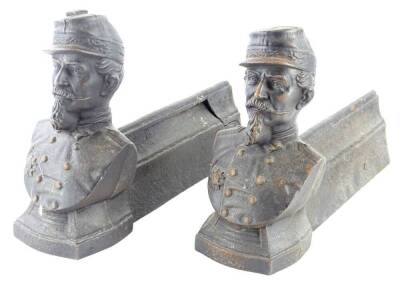 A pair of early 20thC cast iron fire irons, each modelled in the form of a First World War General, possibly French.