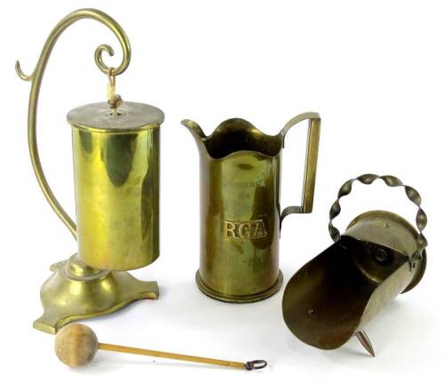 A collection of Trench Art, to include a brass gong, with scroll suspension etc., a miniature coal scuttle and a jug, various inscriptions to include RGA and dated 1916-1919 to the jug etc.