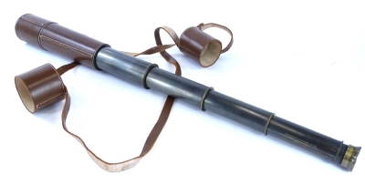 A brass six draw telescope, stamped Broadhurst Clarkson & Co Ltd. of London, with leather mounts etc., 110cm long extended.