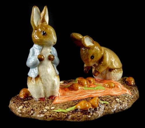 A Beswick Beatrix Potter limited edition figure group, Peter and Benjamin Picking up Onions, number 887 of 3000, boxed.