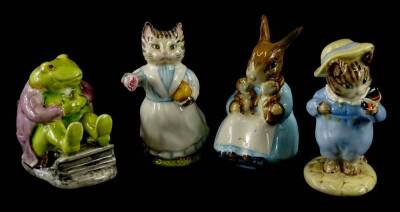 Four Beswick Beatrix Potter figures, Tom Kitten and Butterfly, Mr Jackson, Tabitha Twitchett and Mr Rabbit and Bunnies, all brown backstamp.