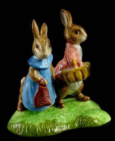 A John Beswick Beatrix Potter figure group, Flopsy and Benjamin Bunny, boxed.