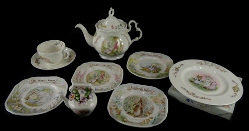 A collection of Royal Albert World of Beatrix Potter plates, a teapot, etc.