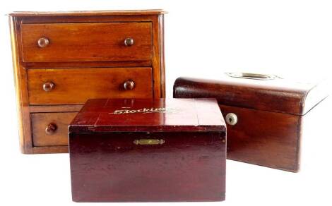 A Victorian mahogany miniature chest of three drawers, each with turned wood handles, 27cm wide, a walnut jewellery box and another small padded box (3).