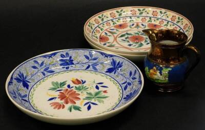 Three similar Staffordshire saucer dishes, each decorated with flowers and a Victorian copper lustre jug. (4)