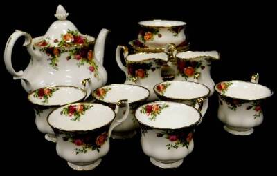 A Royal Crown Derby Old Country Roses part tea service, to include teapot and cover, six cups, saucers, two milk jugs, etc.