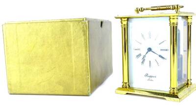 A Rapport brass carriage clock, the white enamel type dial with Roman numerals, in presentation box, 14cm high.