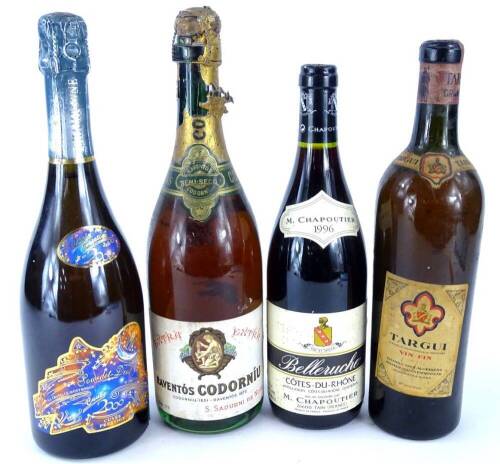 Four bottles of wine, to include Codorniu Demi sec, Belleruche 1996, Millennium champagne for Jourdet-Diot and Targui. (4)