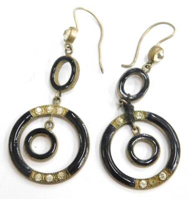 A pair of black enamel and paste stone set drop earrings, with design of circles, silver plated.